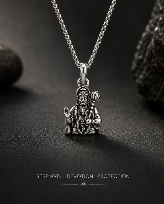 Silver pendant necklace on a dark background with '999 Pure Silver' text.