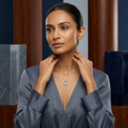 woman wearing ginkgo leaf silver pendant necklace with cubic zirconia
elegant sterling silver ginkgo leaf pendant necklace for everyday wear