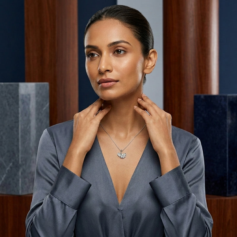woman wearing ginkgo leaf silver pendant necklace with cubic zirconia
elegant sterling silver ginkgo leaf pendant necklace for everyday wear