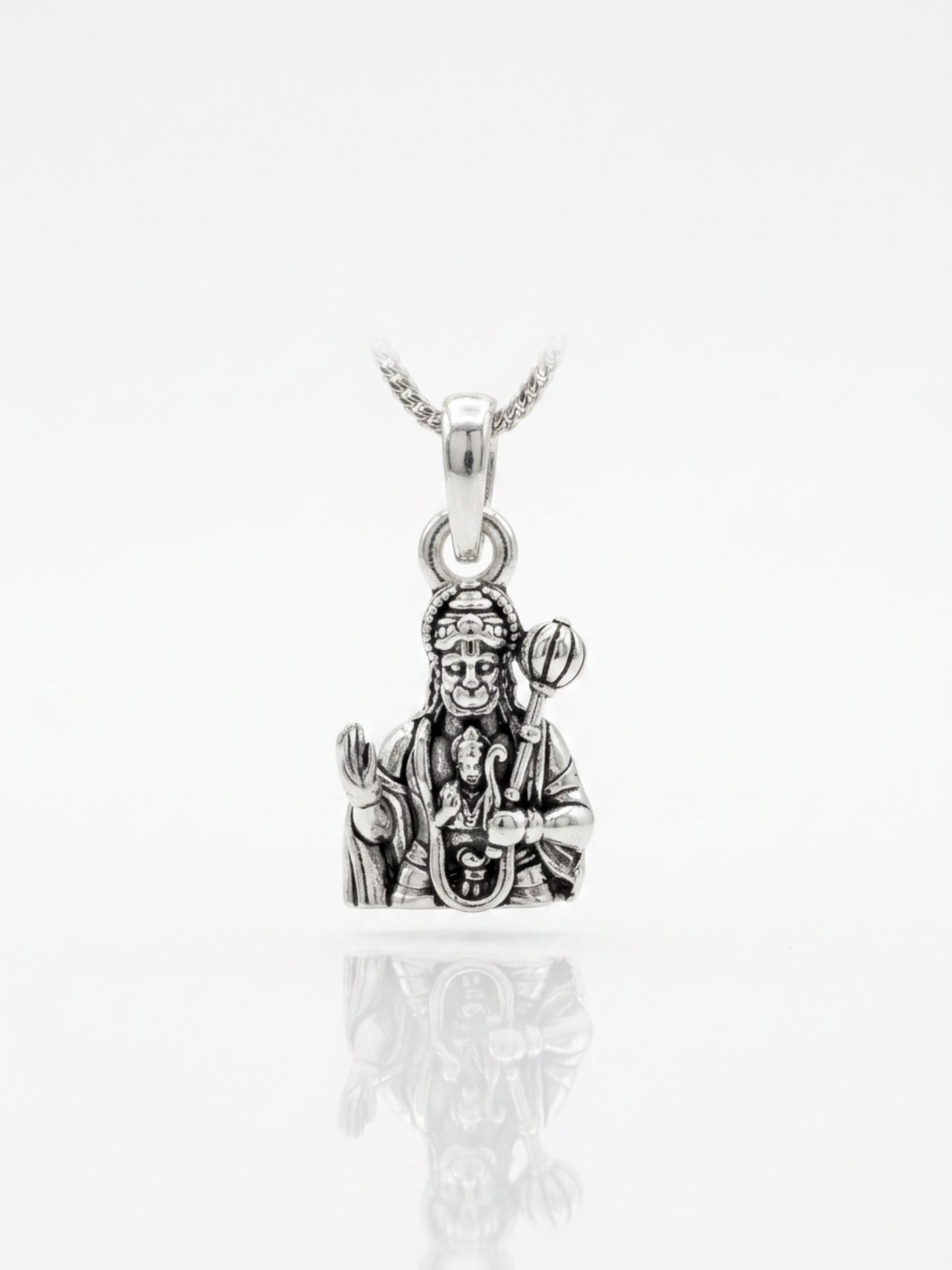 Lord Hanuman Silver Pendant displayed on luxury background