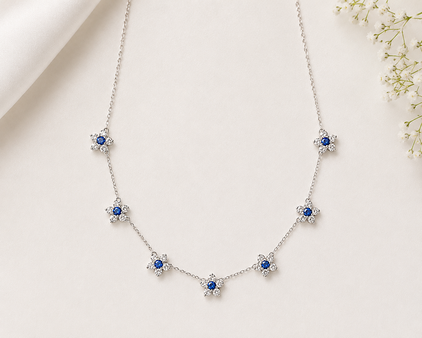 AANYA Blue CZ Floral Station Necklace