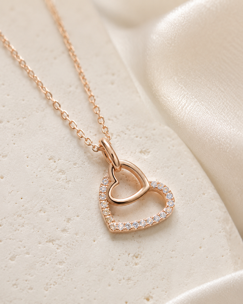 Close-up of Double Heart Halo pendant showcasing sparkling CZ detailing