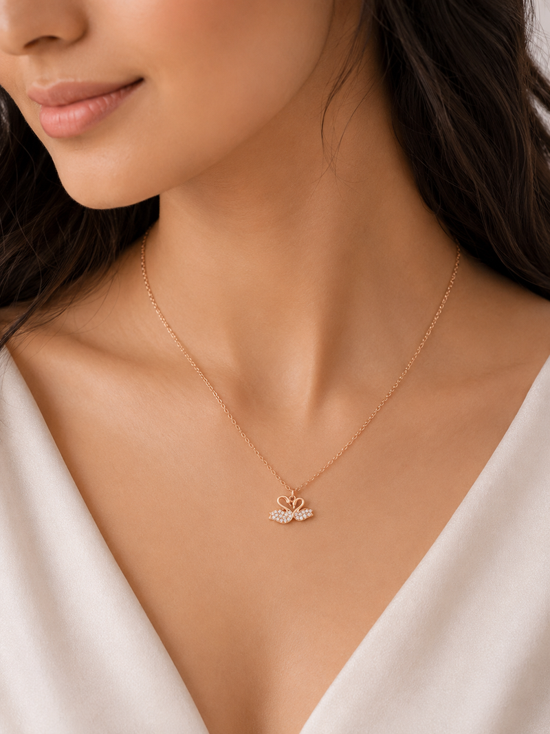 AANYA Twin Swan CZ Silver Pendant featuring sparkling Cubic Zirconia stones