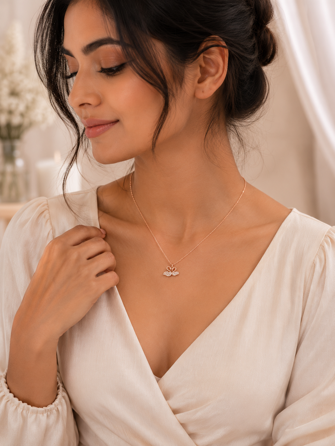 Elegant twin swan pendant styled for romantic and everyday wear