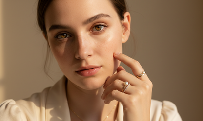 Woman wearing jewelry with a soft focus background