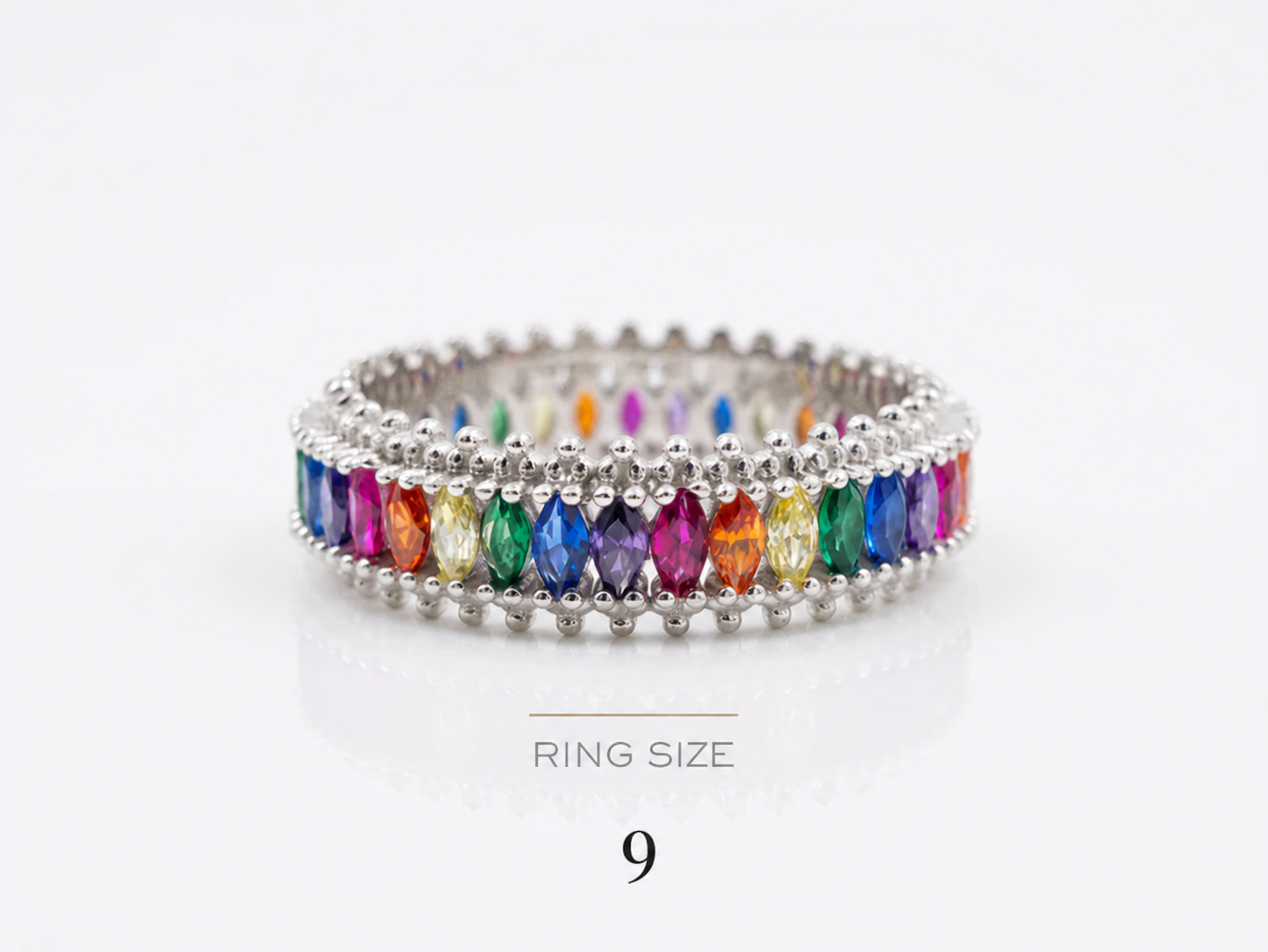 Multicolored gemstone Power Baguette Statement Slim ring on a white background 